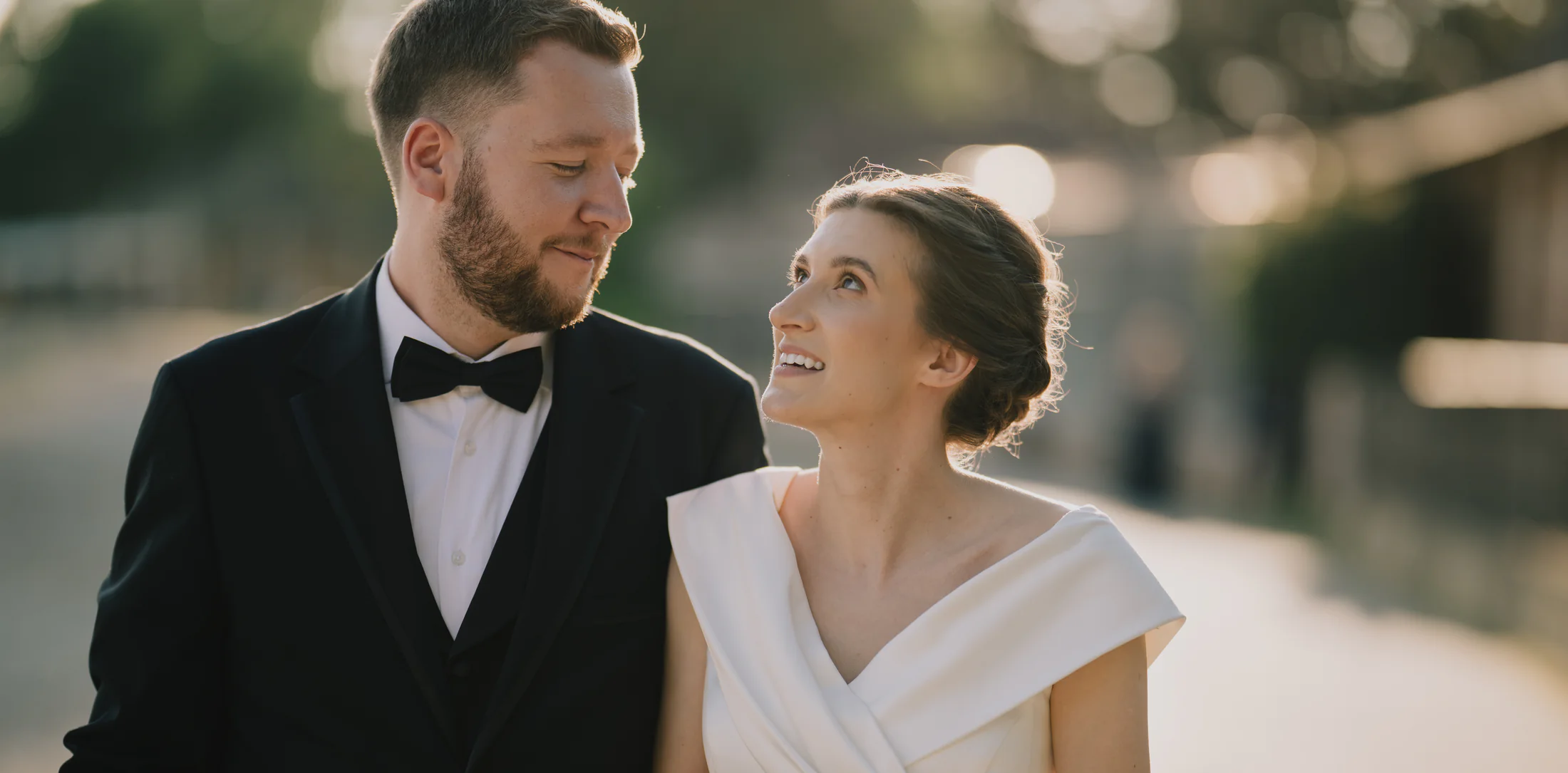 Bride and groom beside Jarun Lake at golden hour